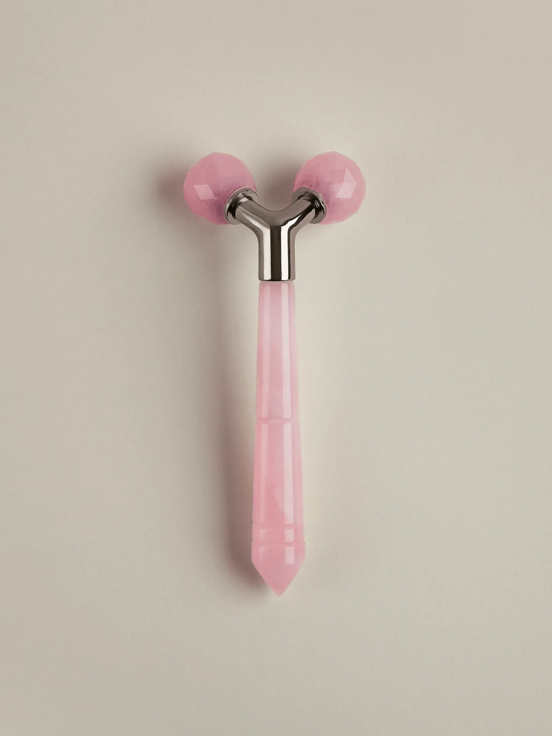 The Rose Quartz Tension Melting Massager for the Face &amp; Neck