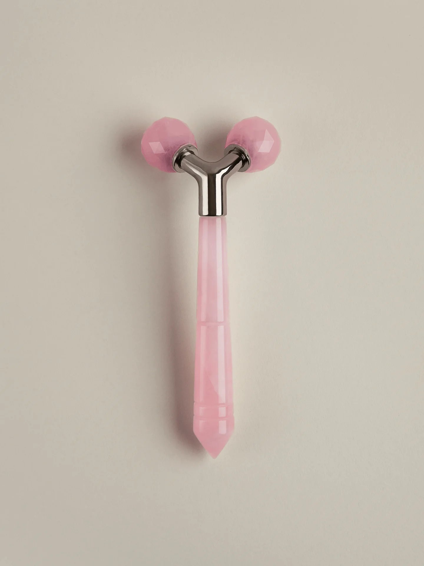 The Rose Quartz Tension Melting Massager for the Face &amp; Neck