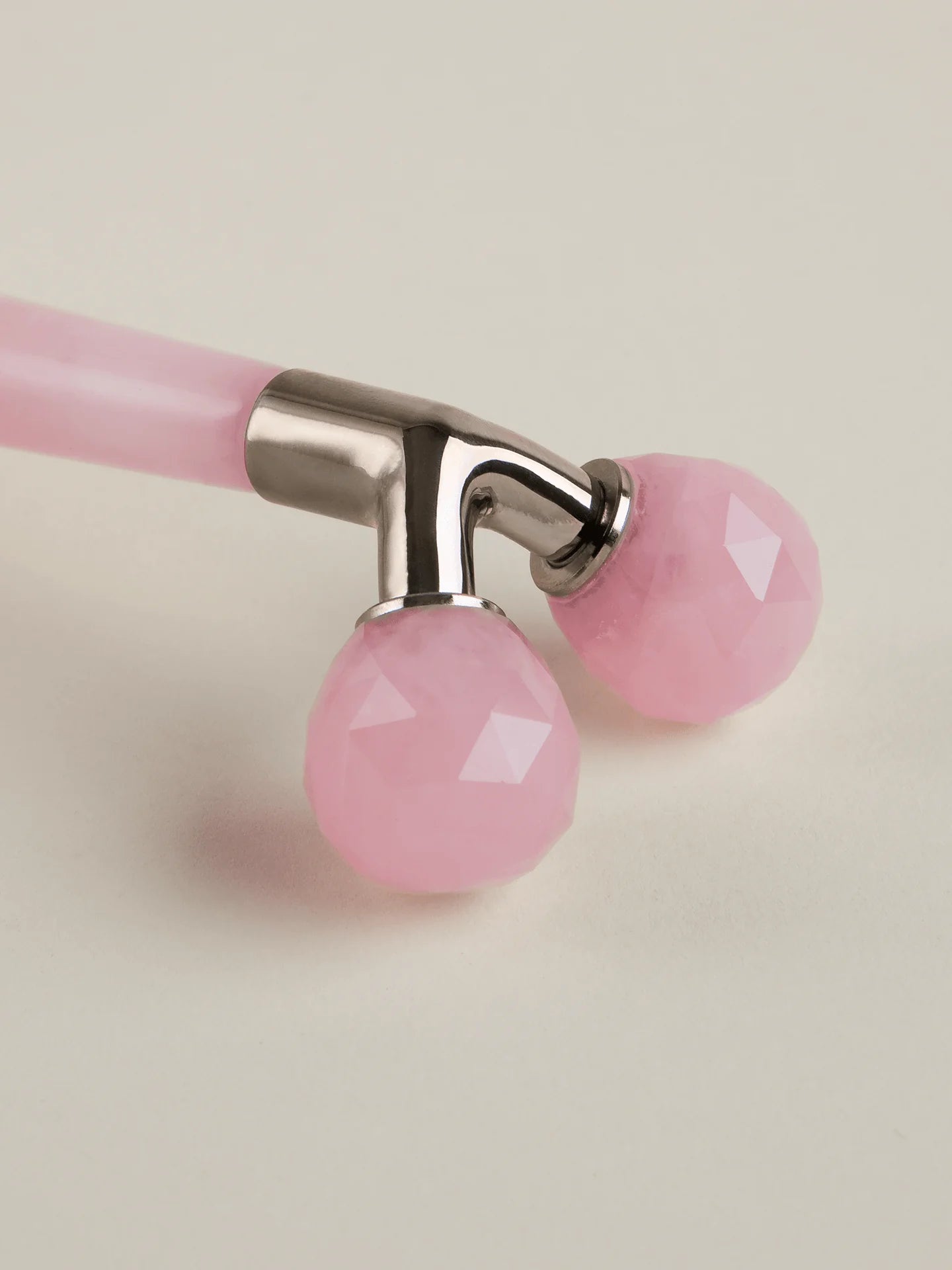 The Rose Quartz Tension Melting Massager for the Face &amp; Neck